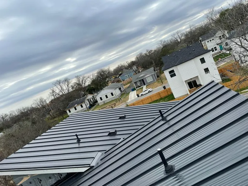 Standing seam metal roof panels with vents for Skylight Repair in Tulsa